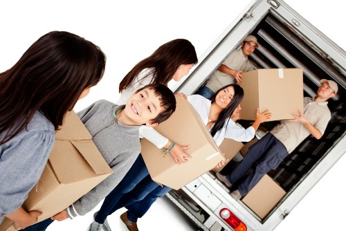 Professional movers assisting a local Kensal Green home move
