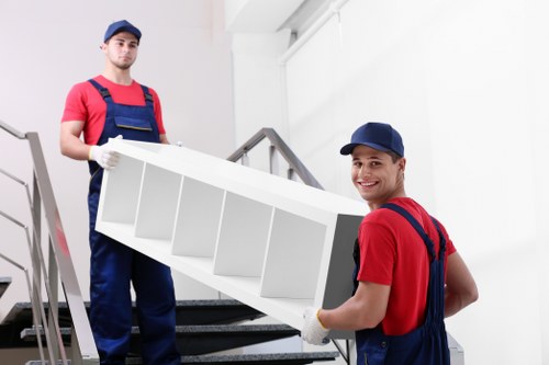 Local removals vehicle loading household items for a Kensal Green move