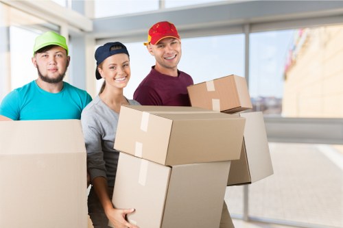 Mover handling furniture carefully during a house move