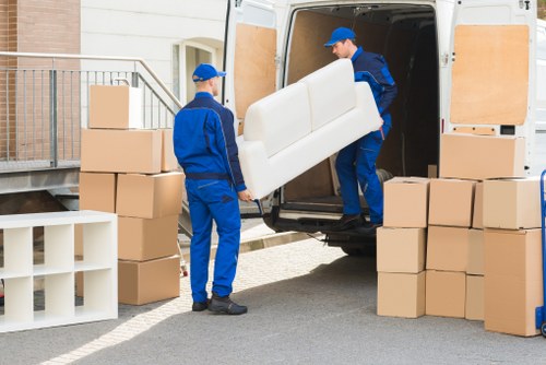 Removal van and packed boxes on a Kensal Green residential street