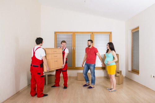 Boxes and furniture prepared for transport in Kensal Green
