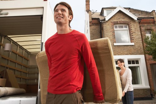 Loading furniture into a van for a Kensal Green house move