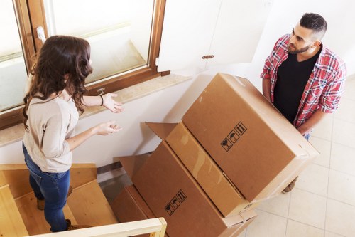 Local movers organising boxes in Kensal Green