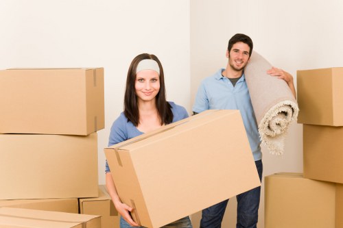 Professional movers navigating a Kensal Green residential street
