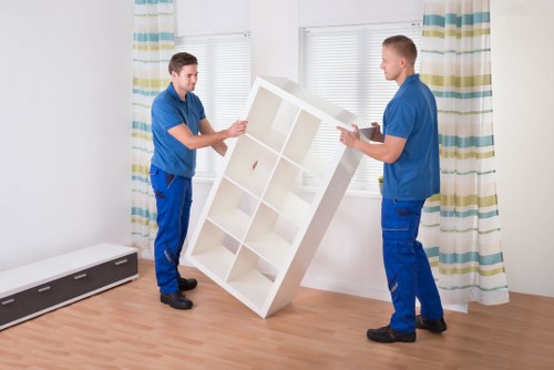 Local moving team handling furniture in Kensal Green