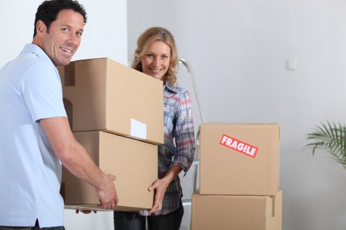 Boxes and furniture prepared for a flat move in Kensal Green