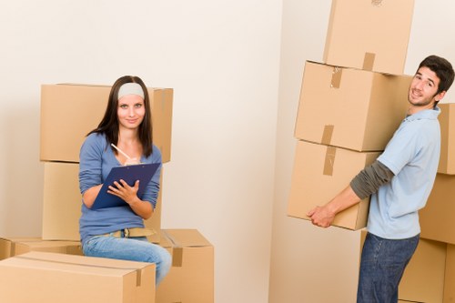 Packed boxes and furniture ready for transport in Kensal Green