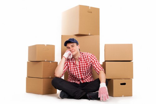 Careful packing of fragile household items in Kensal Green